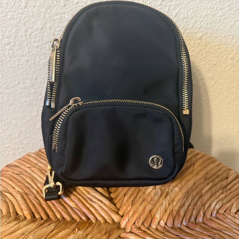 Lululemon Black Mini Backpack with Gold Zippers